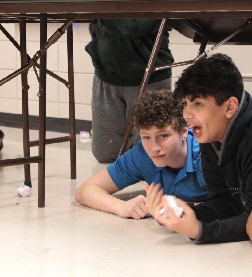 The Central Powers General, Malcolm Riley, prepares for an attack by the other team, the Allies. The paper balls were the ammo used by the Central Powers and the Allies in the activity on Feb. 8, 2023. 