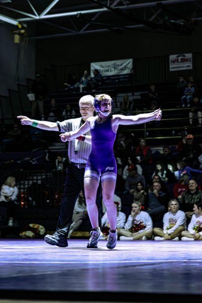 Junior Savannah Shires gets excited during match.